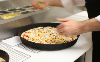 Pizzas being prepared at La Piazza takeaway in Carlton, Nottingham