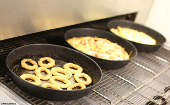 Onion rings and pizzas freshly cooked at La Piazza in Nottingham